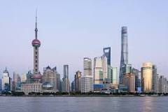 Is Shanghai Tower bigger than Burj Khalifa?